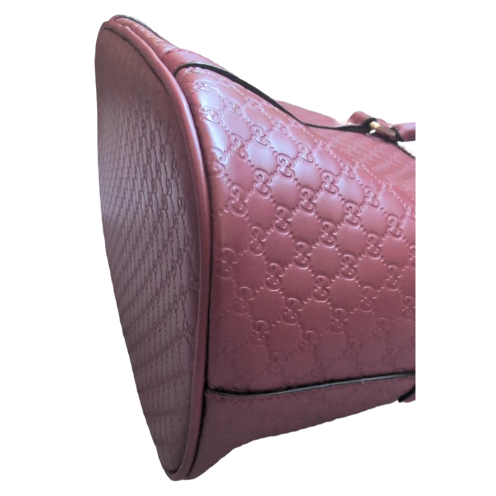 corners of Pre-Owned Gucci GG Medium Red Top Handle Bag Guccissima