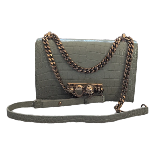 Front view of Pre-Owned Alexander McQueen Skull Jewelled  Croc-Embossed Chain Shoulder Bag