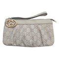 front of Pre-Owned Gucci Beige Leather Pouch Clutch