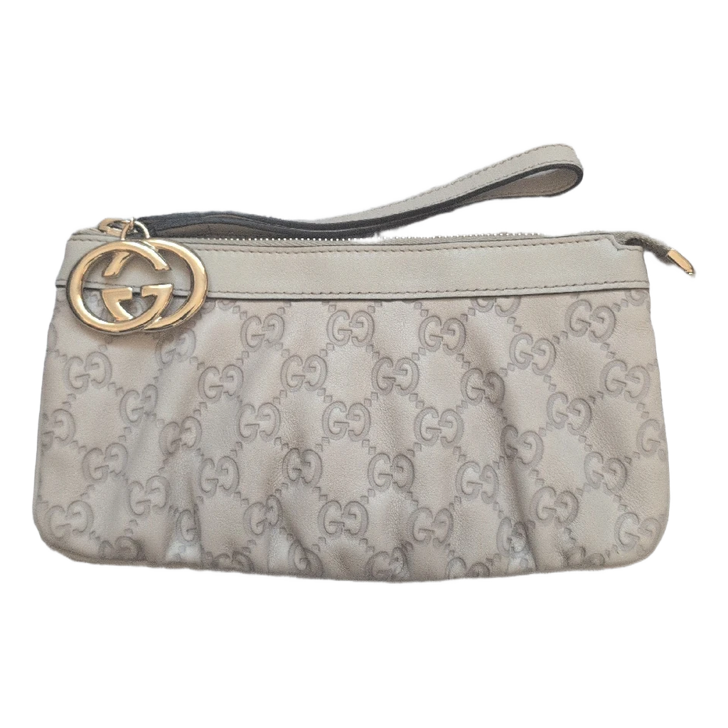 front of Pre-Owned Gucci Beige Leather Pouch Clutch