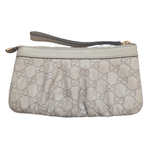 back of Pre-Owned Gucci Beige Leather Pouch Clutch