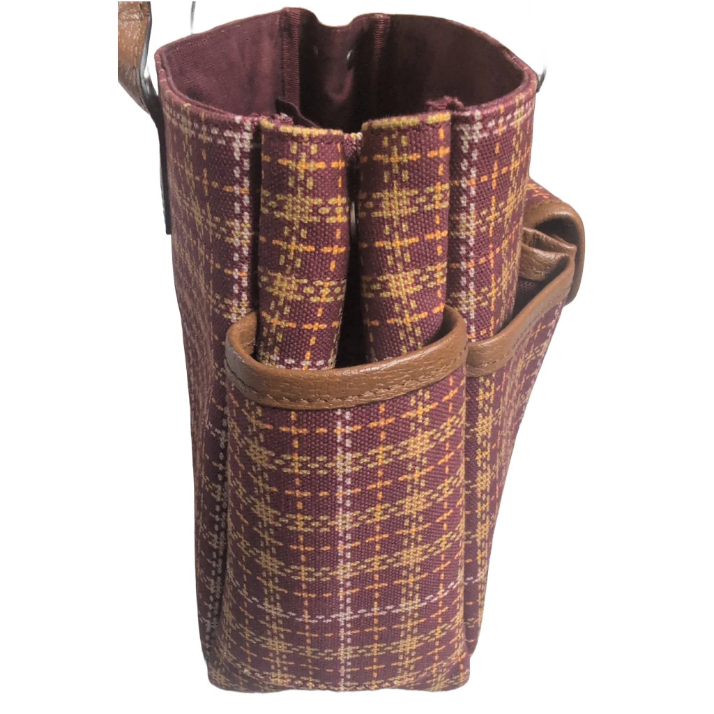 side view of Pre-Owned Gucci Interlocking GG Plaid Brown Multi Canvas Leather Tote