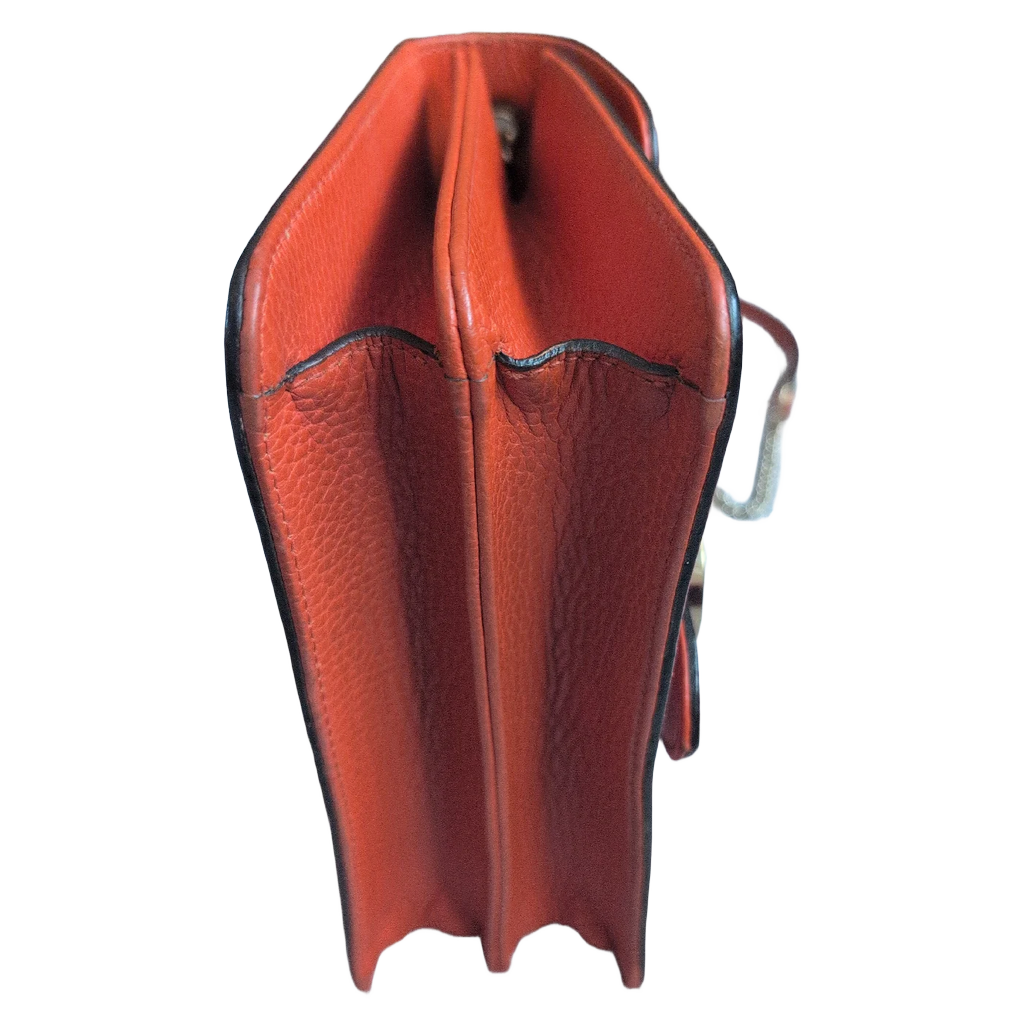 corners of the Orange Gucci GG Interlocking Crossbody Bag 