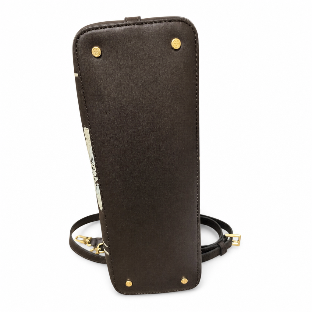 A dark brown leather crossbody phone pouch shown from the back, featuring gold-tone metal studs and a matching black leather strap with gold hardware, set against a plain white background. Pre-Owned Tory Burch  Floral Applique Top Handle Bag