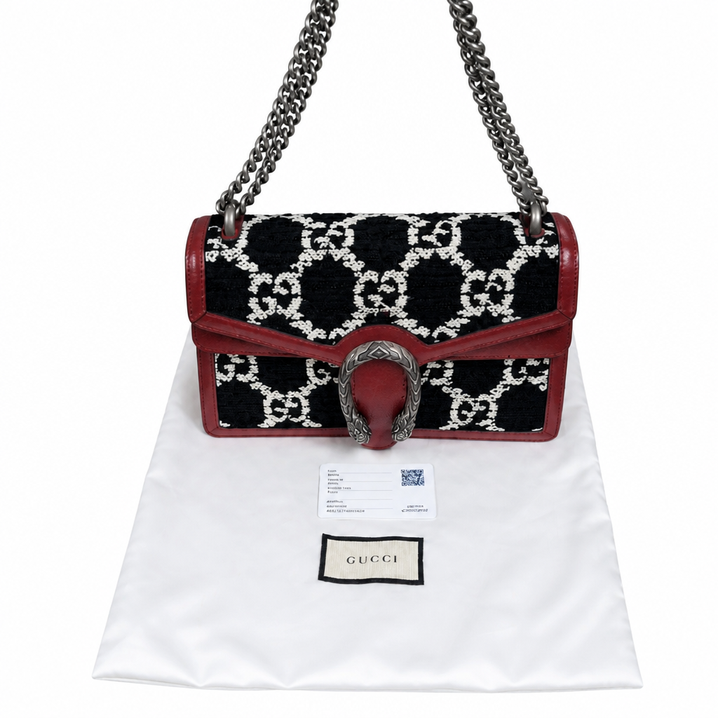 Gucci GG Marmont shoulder bag in black and white GG monogram canvas with red leather trim and a silver-tone horsebit clasp, displayed on a white dust bag with a Gucci dust bag label and an authenticity card. Pre-Owned Gucci Dionysus GG Tweed Medium Shoulder Bag – Red/Black