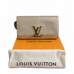 Pre-Owned Louis Vuitton Louise GM Clutch – Metallic Champagne Leather
