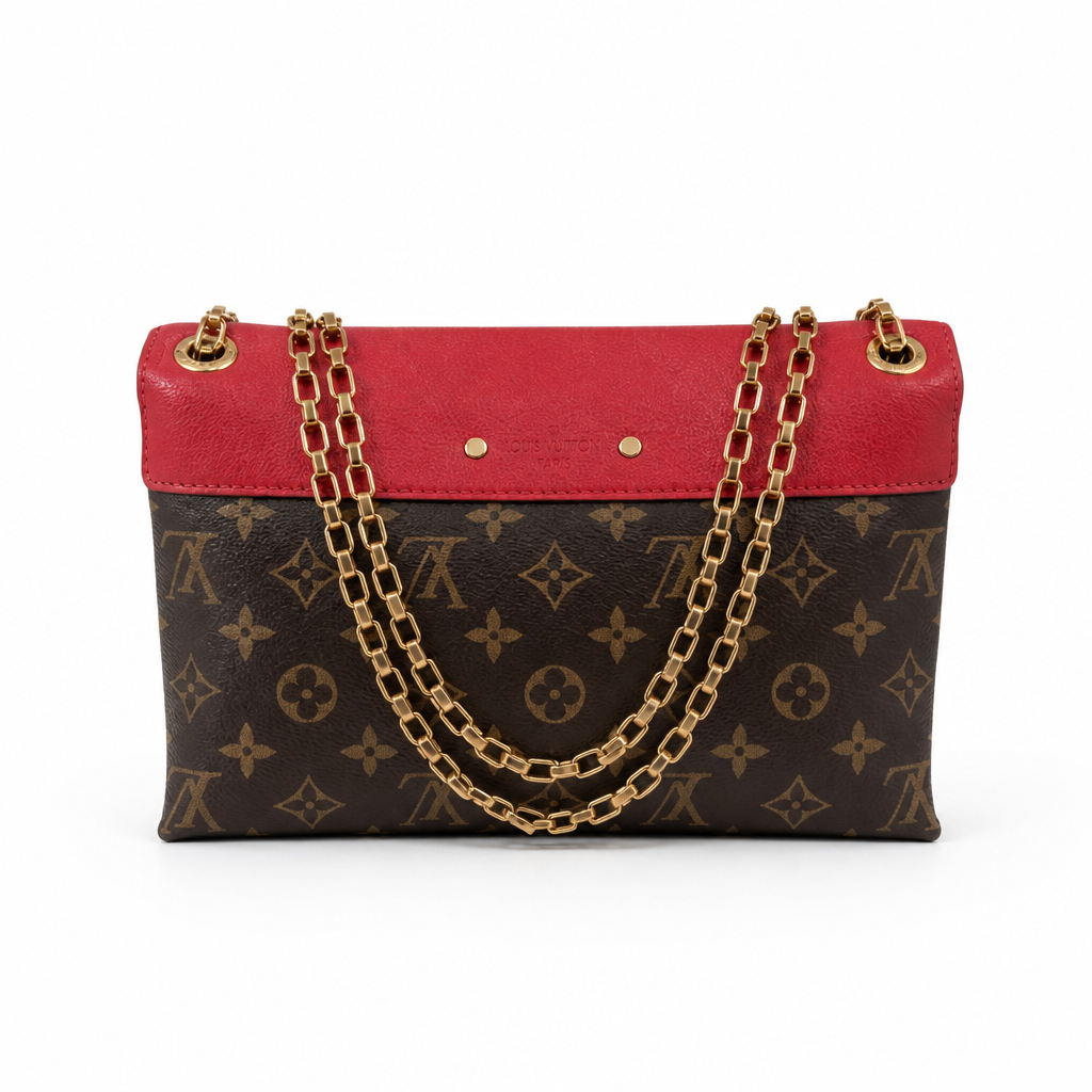 Louis Vuitton monogram canvas handbag with a bright red leather top flap and red leather side panels, gold-tone chain shoulder straps, and gold hardware, shown on a plain white background. Pre-Owned Louis Vuitton Pallas Chain Monogram Canvas Shoulder Bag – Cerise Red – M41201