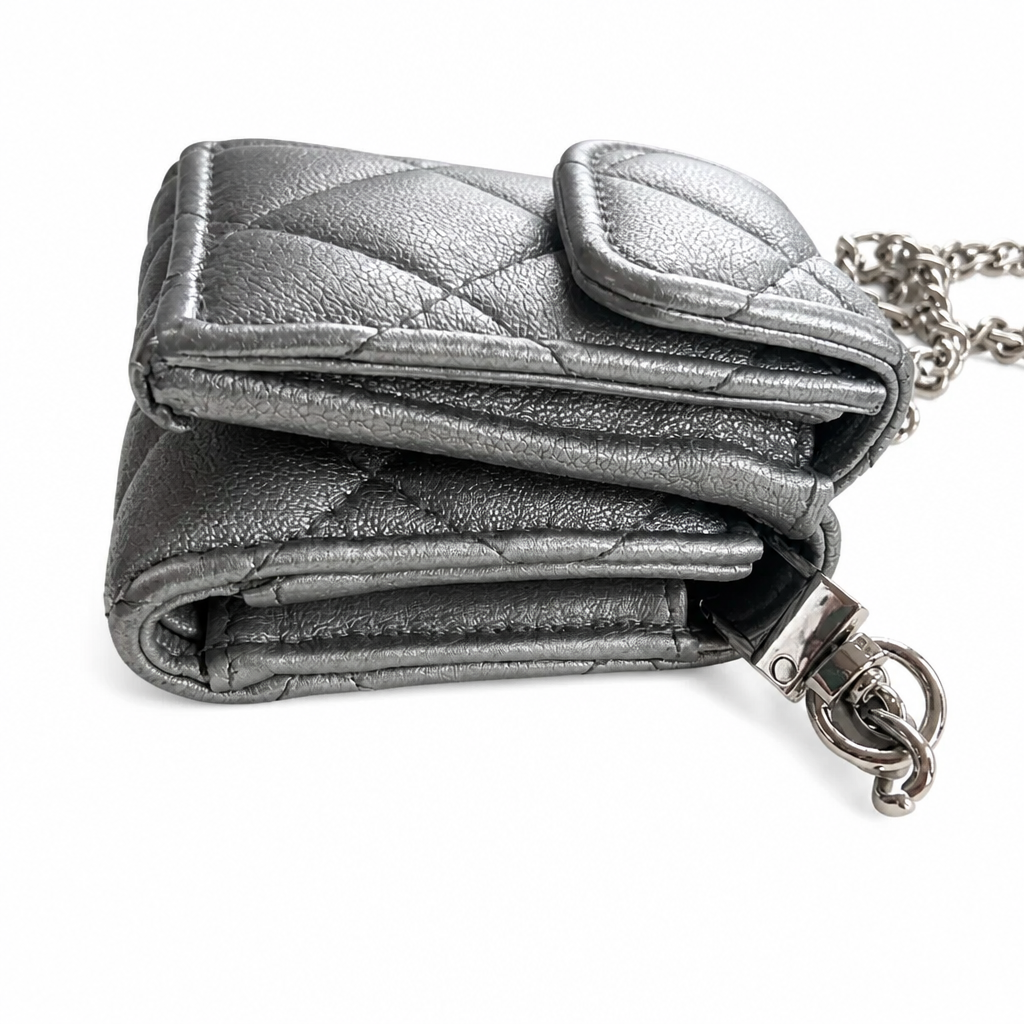 A metallic silver quilted leather wallet with a matching chain strap and clasp, shown on a plain white background. Pre-Owned Chanel Metallic Silver Matelassé Mini Chain Wallet / Micro Crossbody