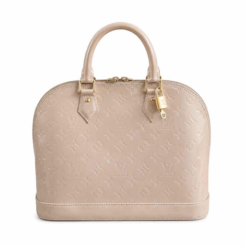 A Louis Vuitton Alma PM handbag in beige monogram coated canvas with gold-tone hardware and a lock, shown against a plain white background. Pre-Owned Louis Vuitton Alma PM Monogram Vernis – Beige Poudre