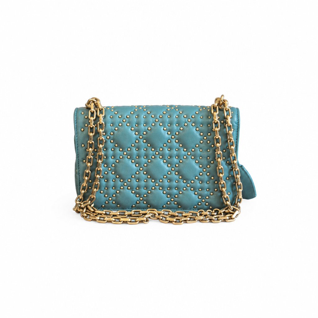 A teal quilted leather shoulder bag with gold-tone studs and a gold chain strap, shown against a plain white background. Pre-Owned Christian Dior Small DiorAddict Cannage Studded Flap Bag – Light Blue Lambskin