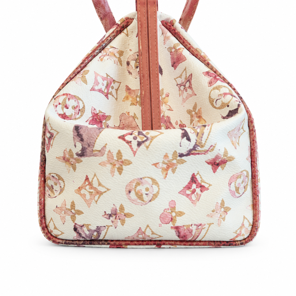 A Louis Vuitton handbag featuring a cream-colored textured canvas body with a watercolor-style monogram print in pink, brown, and gold, finished with reddish-brown leather trim and handles. Pre-Owned Louis Vuitton x Richard Prince Limited Edition Monogram Aquarelle Watercolor Frame Speedy 30 – 2008