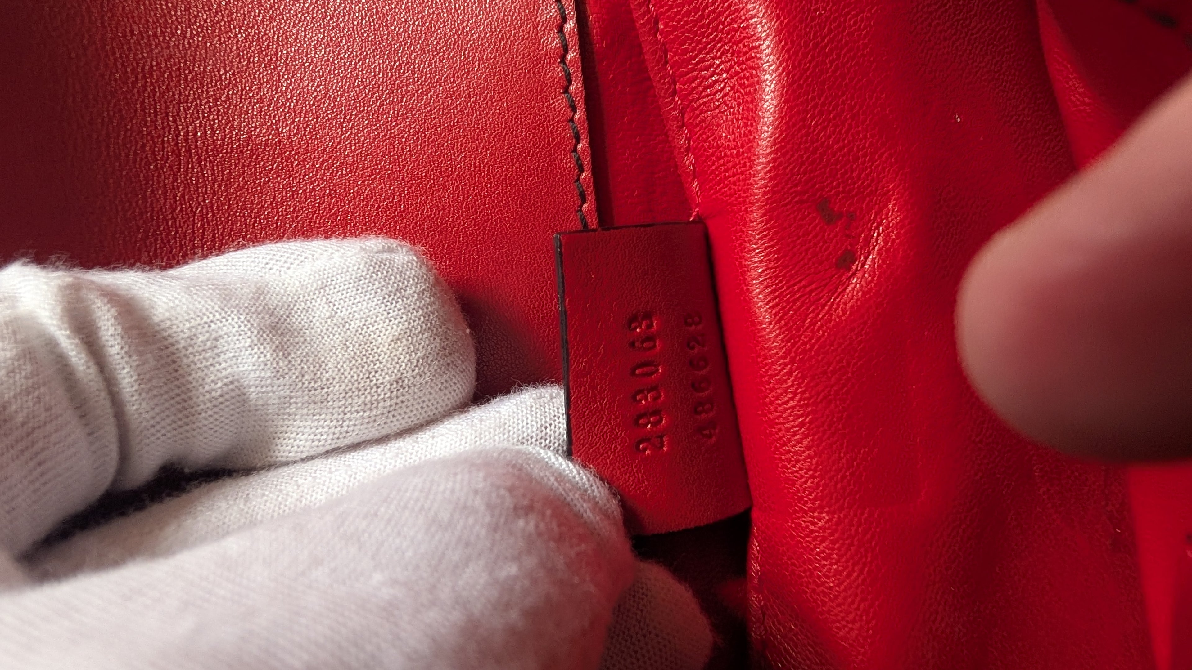 Serial number label for Pre-owned Gucci Red Emily Leather Gold Hardware Handbag Crossbody Bag