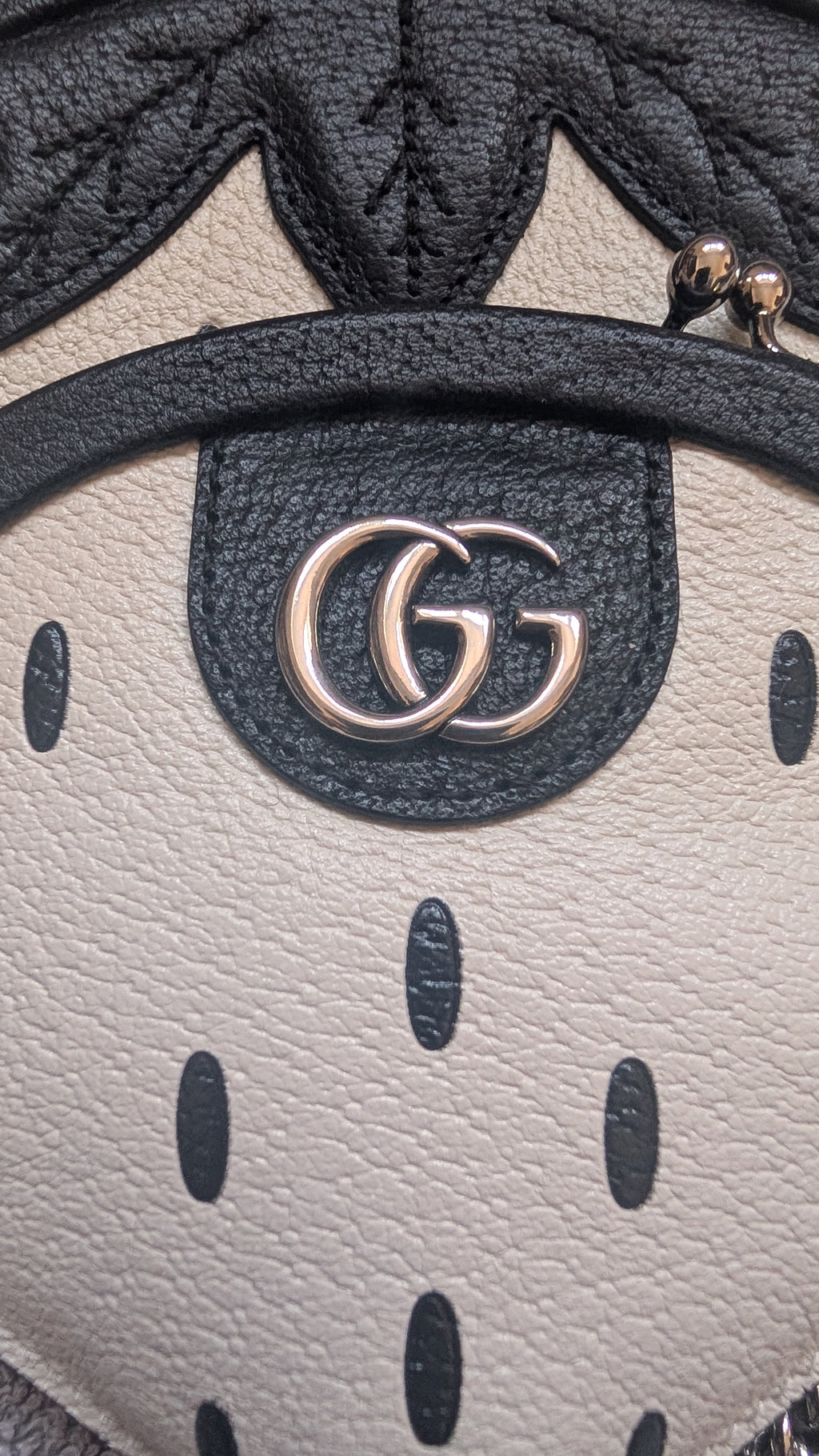 close up of the GG logo for the Pre-owned Gucci Strawberry Cross Body Bag Black & White