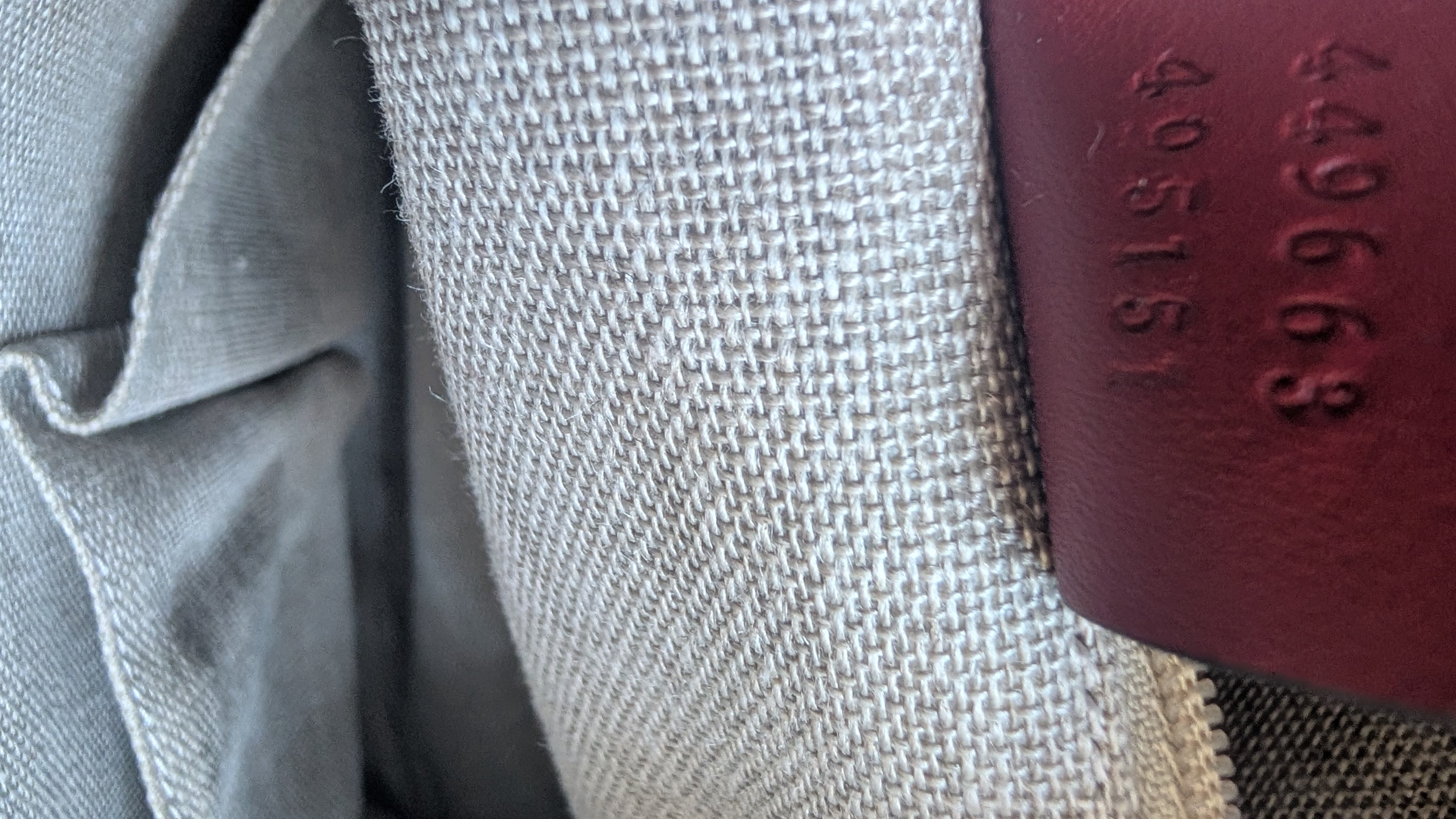 showing brand serial number inside of Pre-Owned Gucci GG Medium Red Top Handle Bag Guccissima