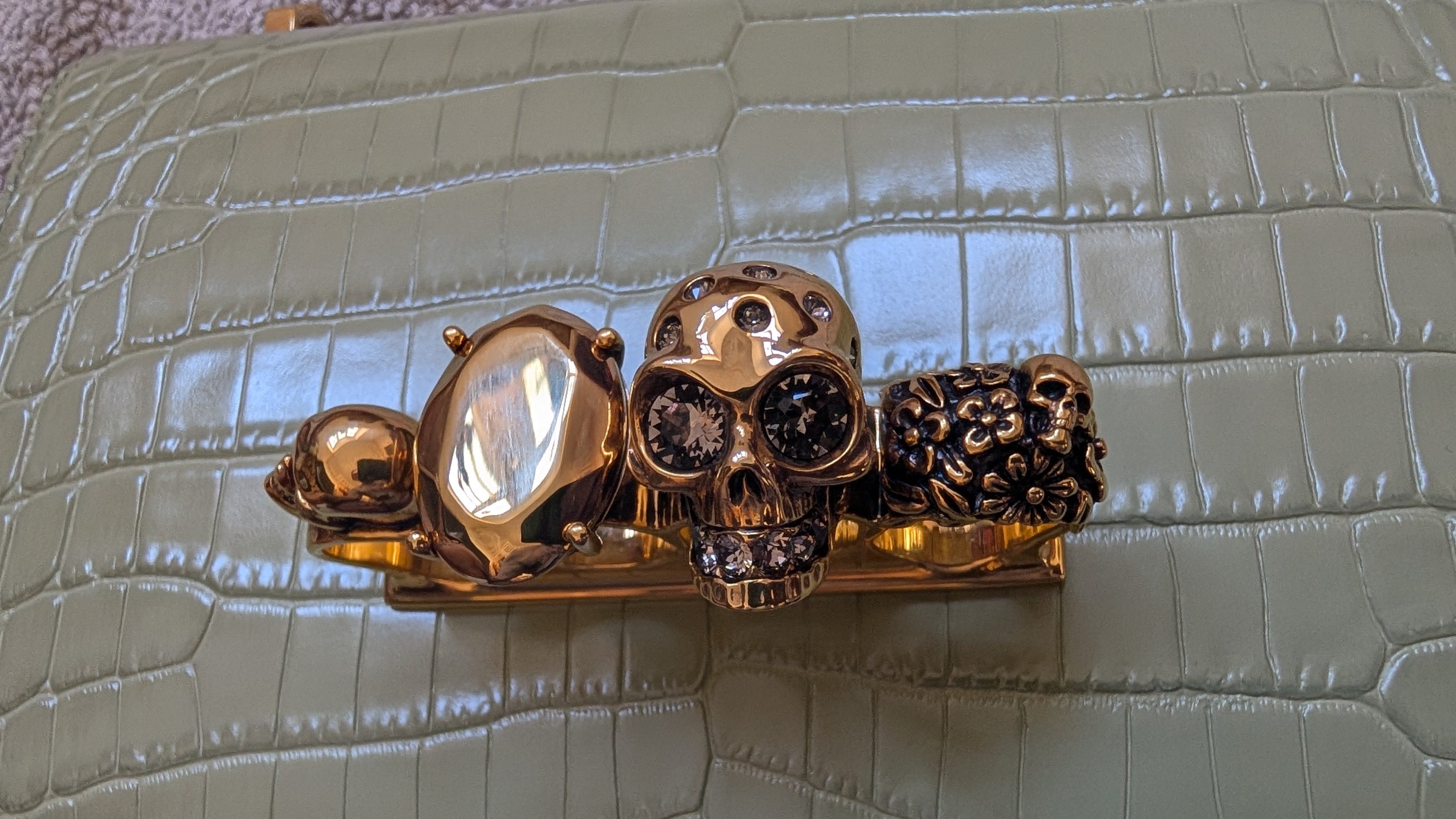 Close up of the 4 jewelled skulls   Pre-Owned Alexander McQueen Skull Jewelled  Croc-Embossed Chain Shoulder Bag