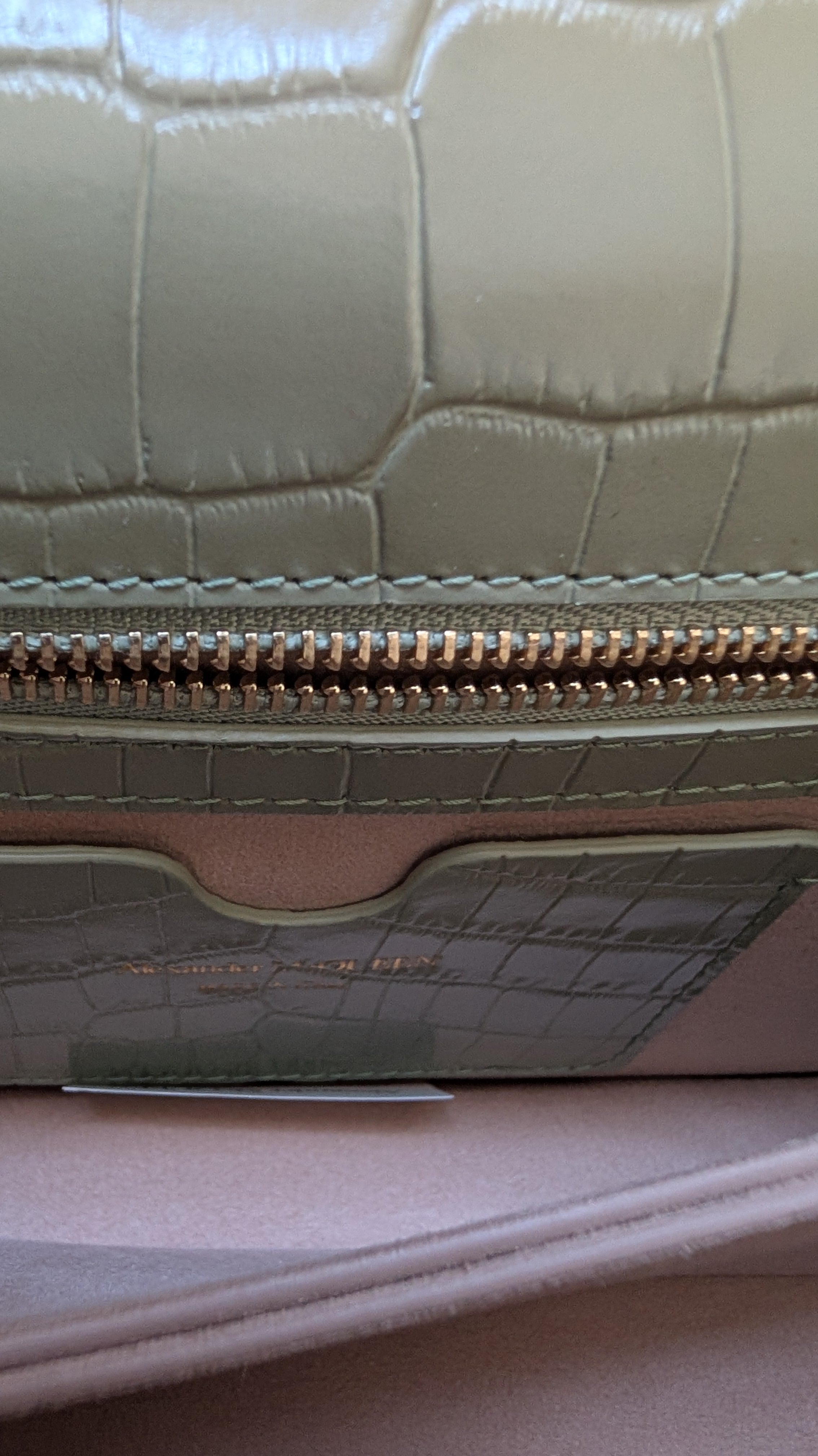 Showing cleanlinss inside the Pre-Owned Alexander McQueen Skull Jewelled  Croc-Embossed Chain Shoulder Bag