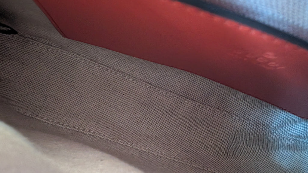 close up of inside of Pre-owned Gucci GG Quilted Matelasse Leather Mini Shoulder Bag In Orange