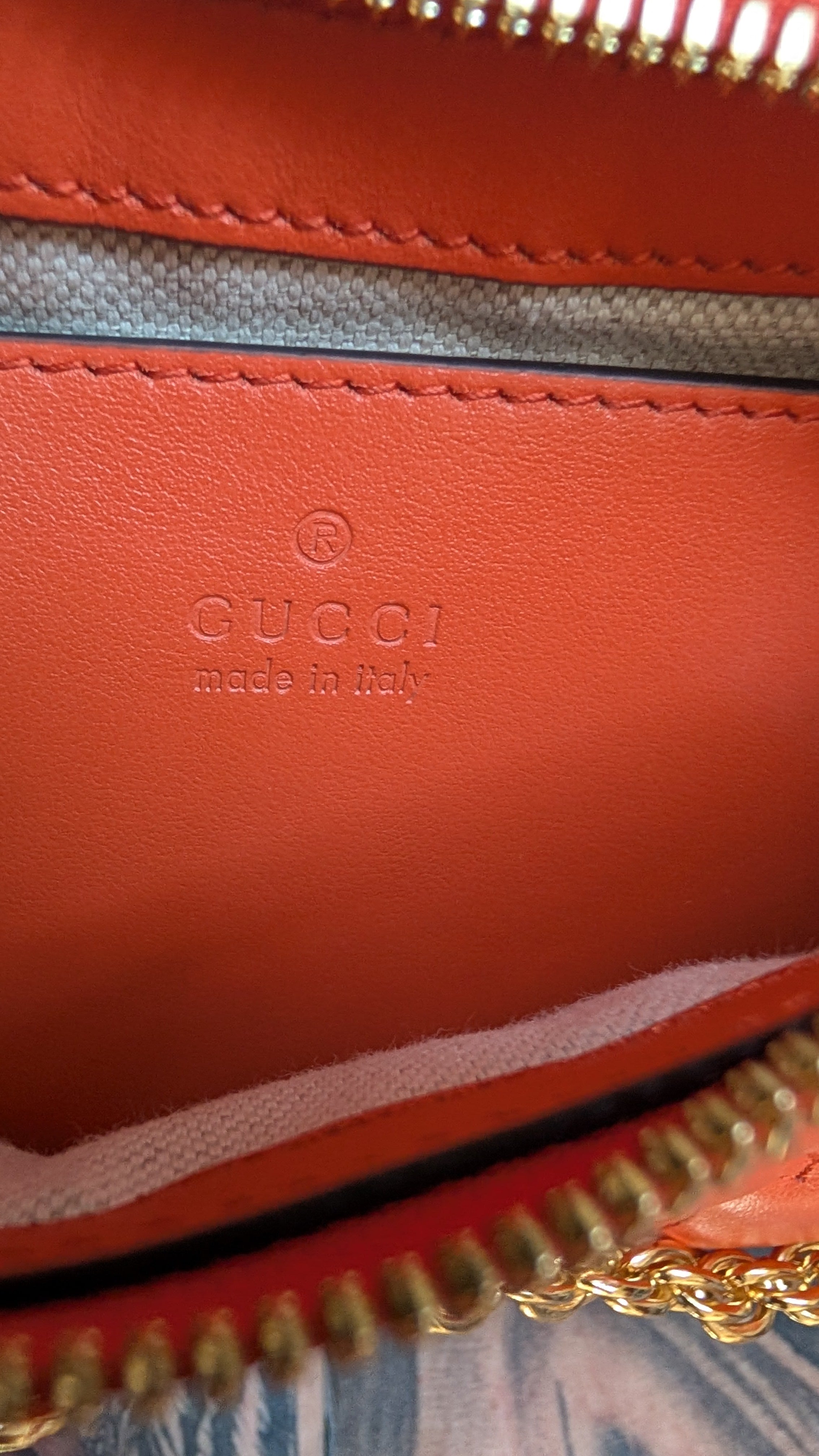 close up of Gucci logo inside Pre-owned Gucci GG Quilted Matelasse Leather Mini Shoulder Bag In Orange