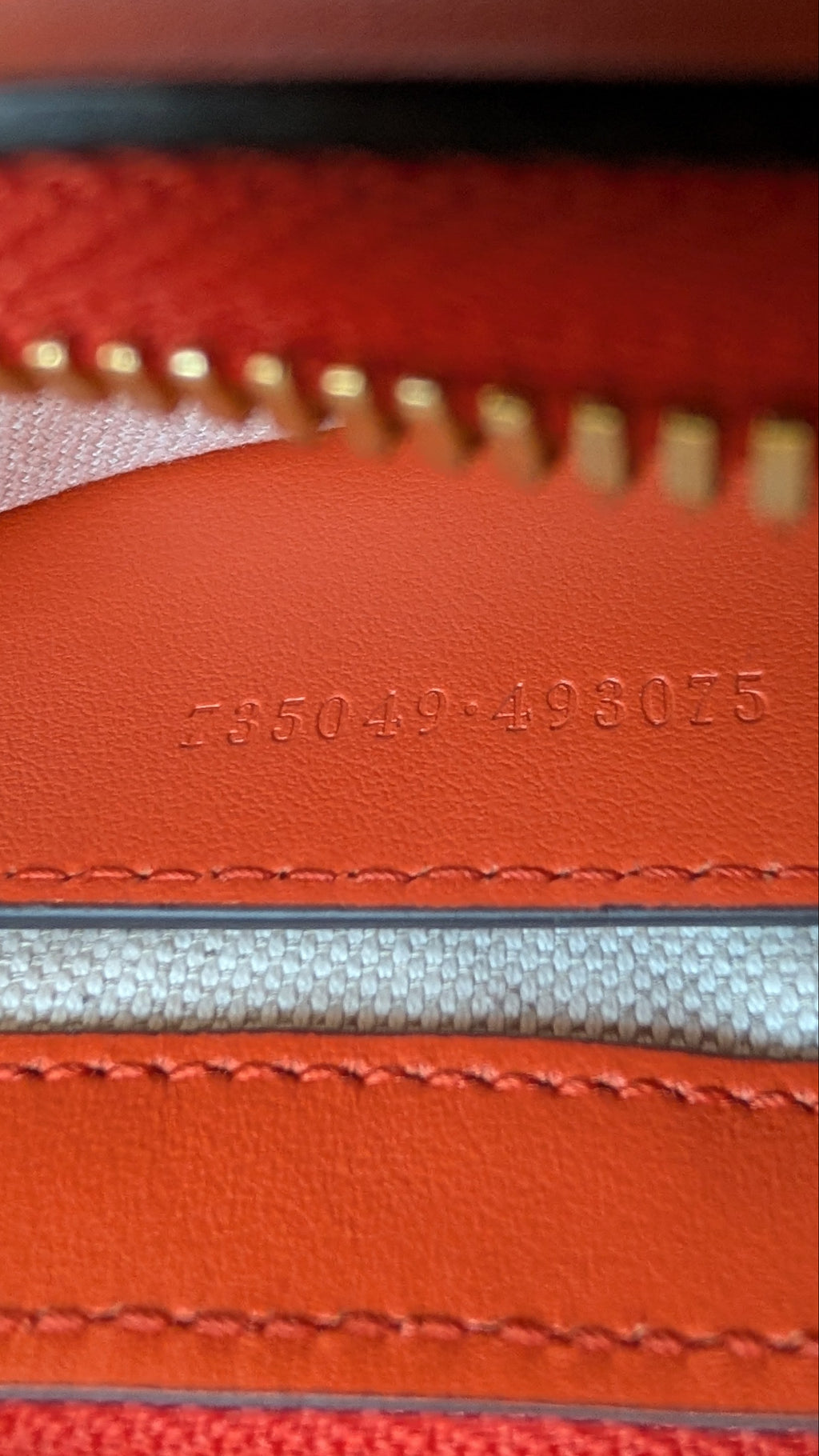 close up of serial number for Pre-owned Gucci GG Quilted Matelasse Leather Mini Shoulder Bag In Orange