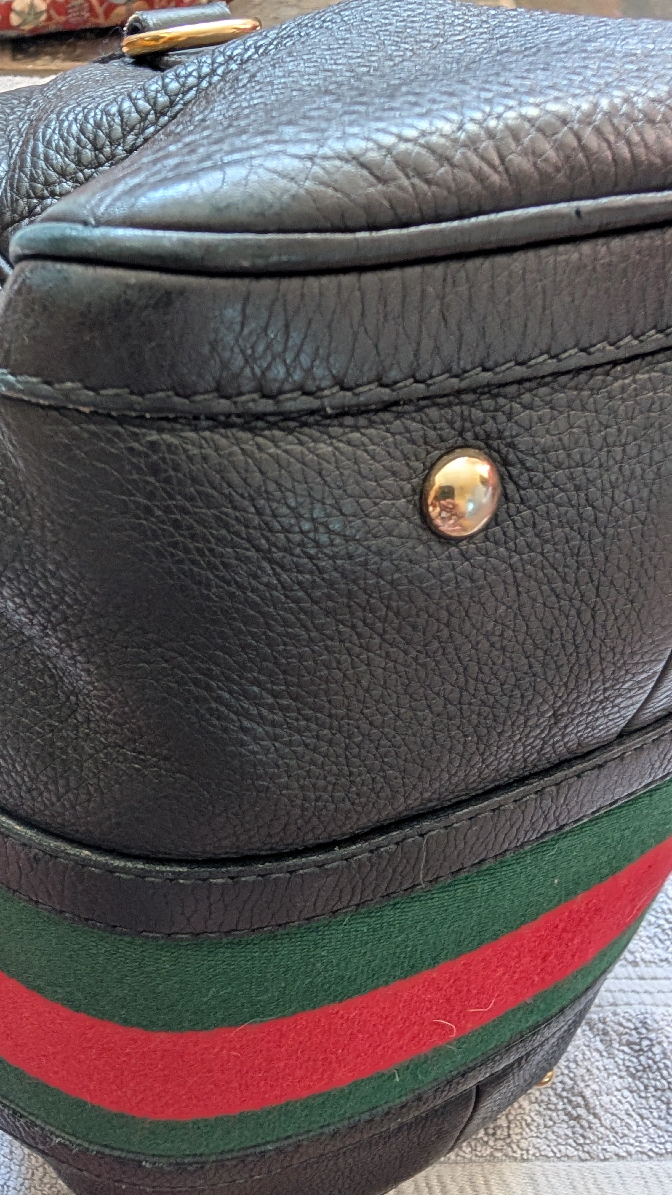 corner 2 of Pre-Owned Gucci Black Leather Striped Boston Bag with Strap