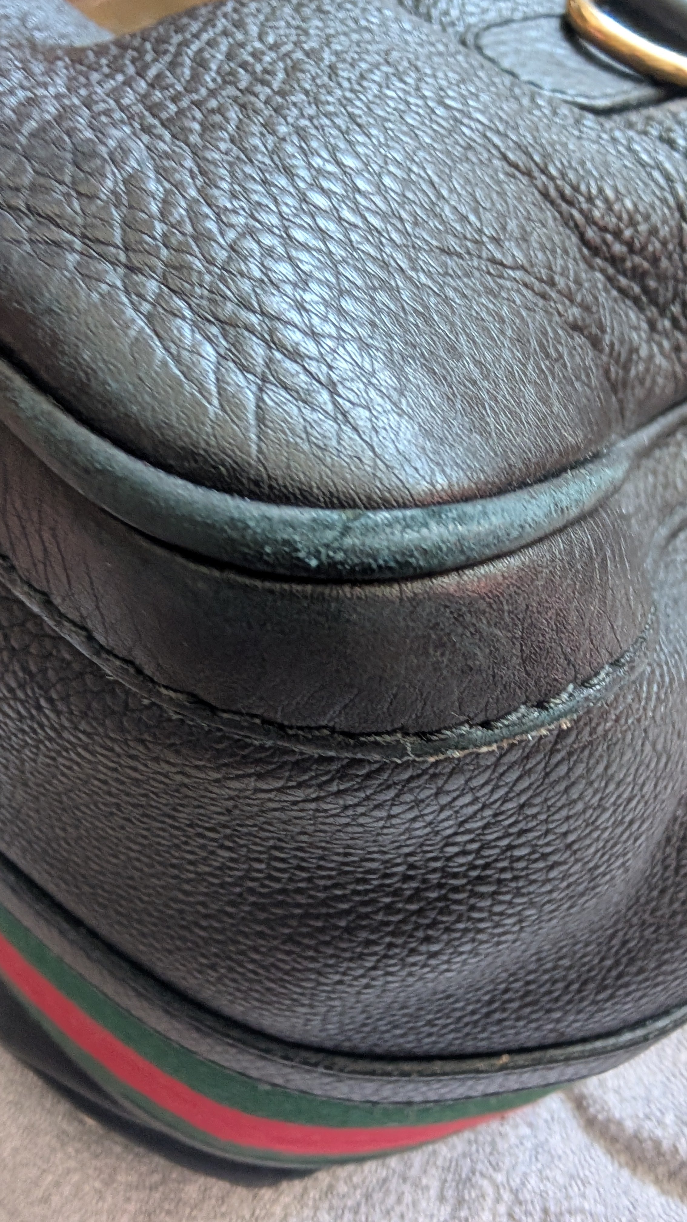 corner of Pre-Owned Gucci Black Leather Striped Boston Bag with Strap