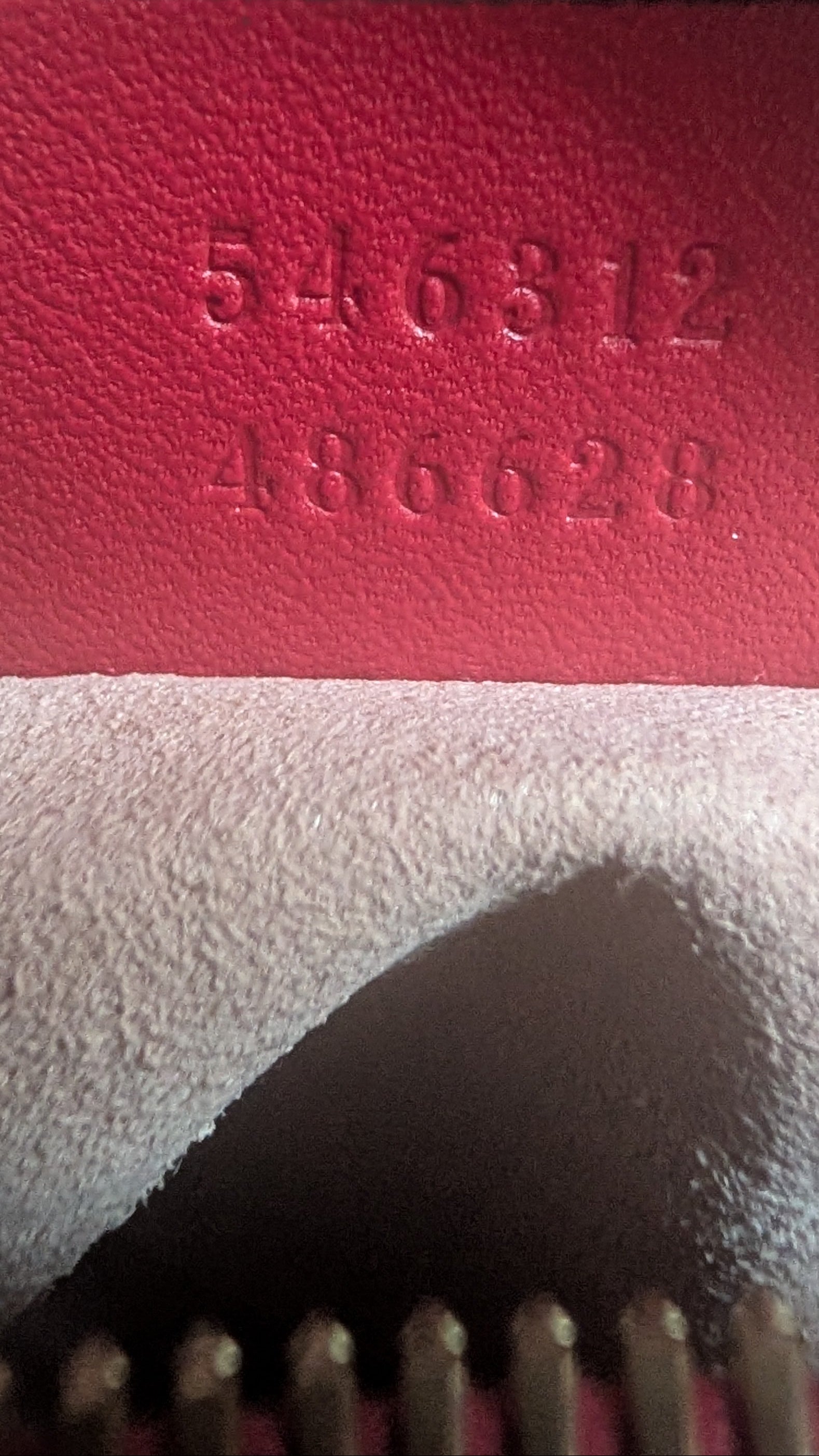 close up of the serial number for Gucci GG Supreme Blooms Mini Boston bag