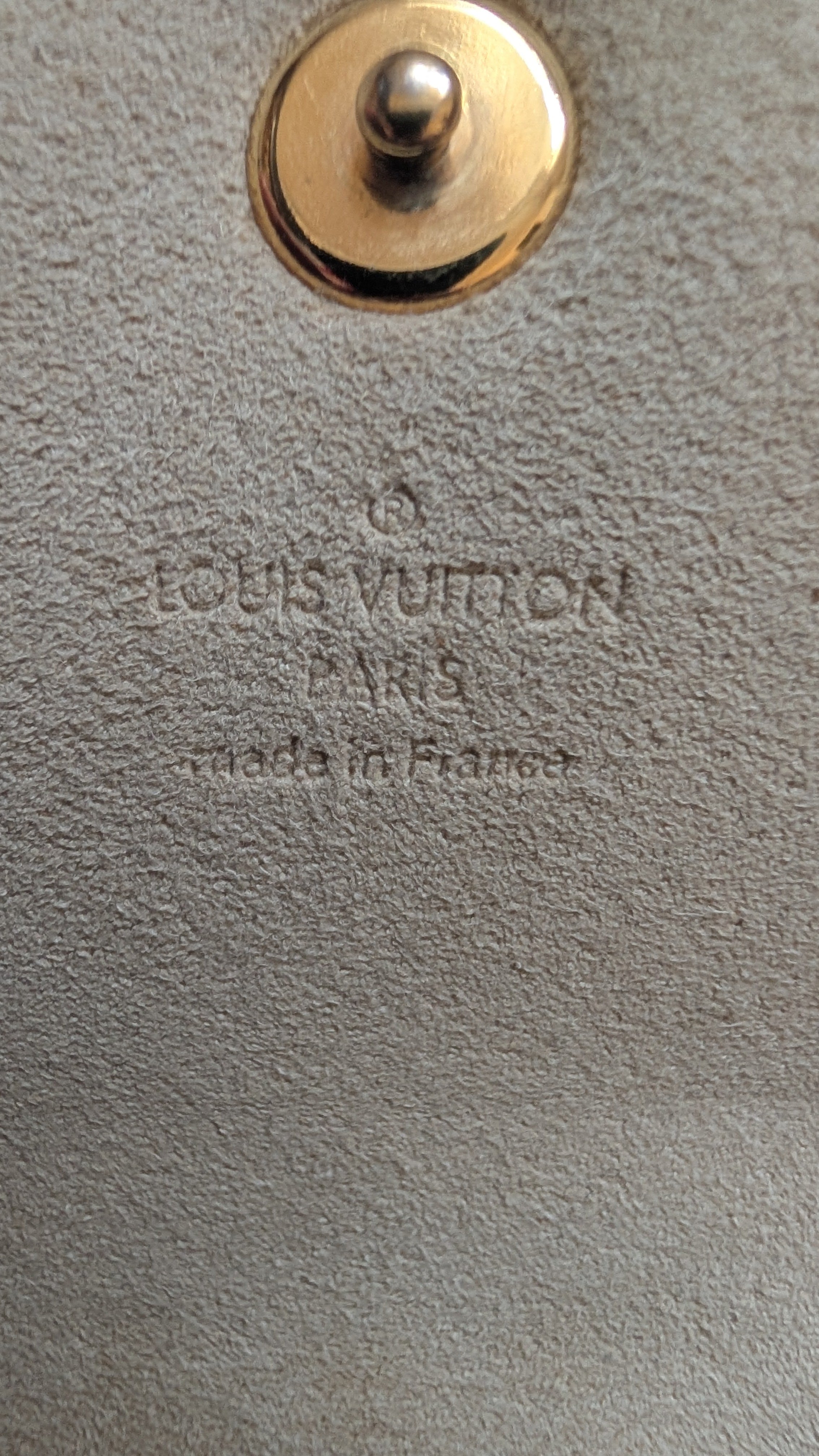 showing branding on inside Pre-Owned Louis Vuitton Monogram Pochette Cancun Shoulder Bag