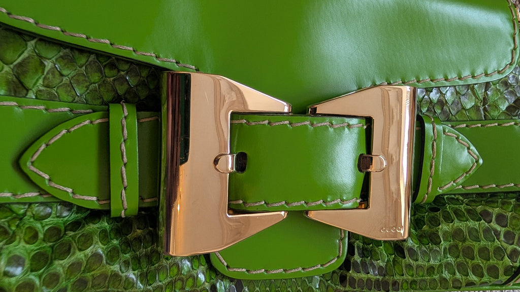 gold hardware for Pre-owned Gucci Green & Black Clutch Snake Print