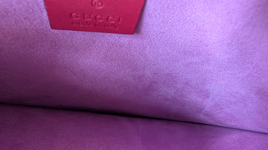 inside the Pre-Owned Gucci GG Supreme Dog Bosco Applique Pouch Clutch Bag in Canvas