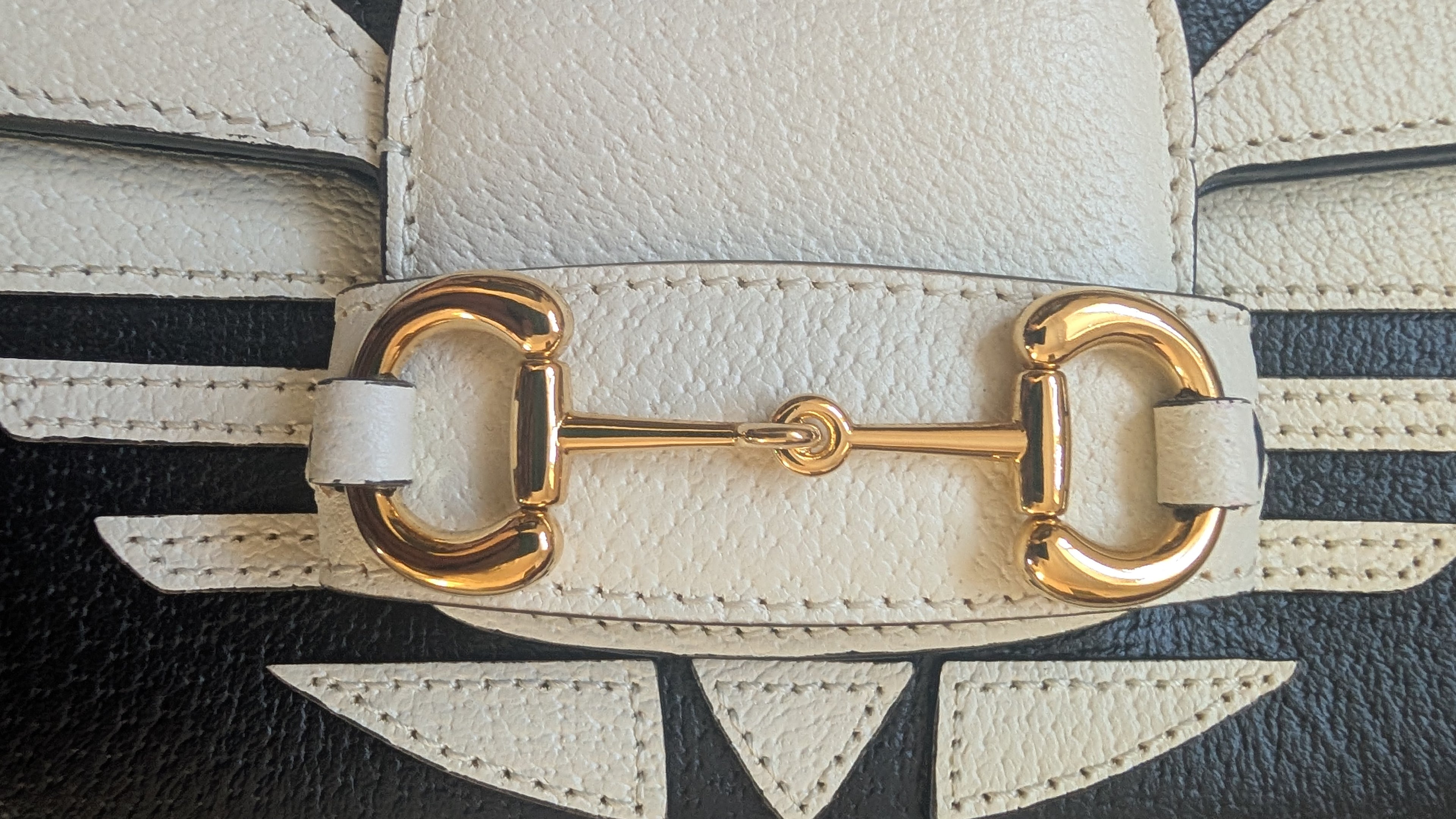 horsebit hardware Pre-owned Gucci and Adidas Originals Black and white Horsebit
