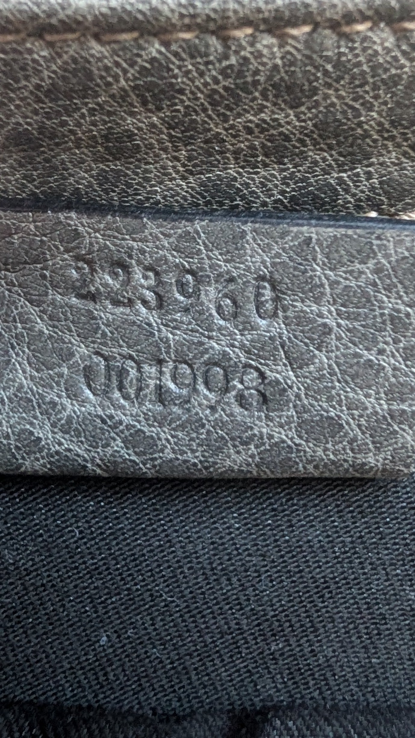 serial number for Pre-owned Gucci Pelham Monogram Canvas Clutch