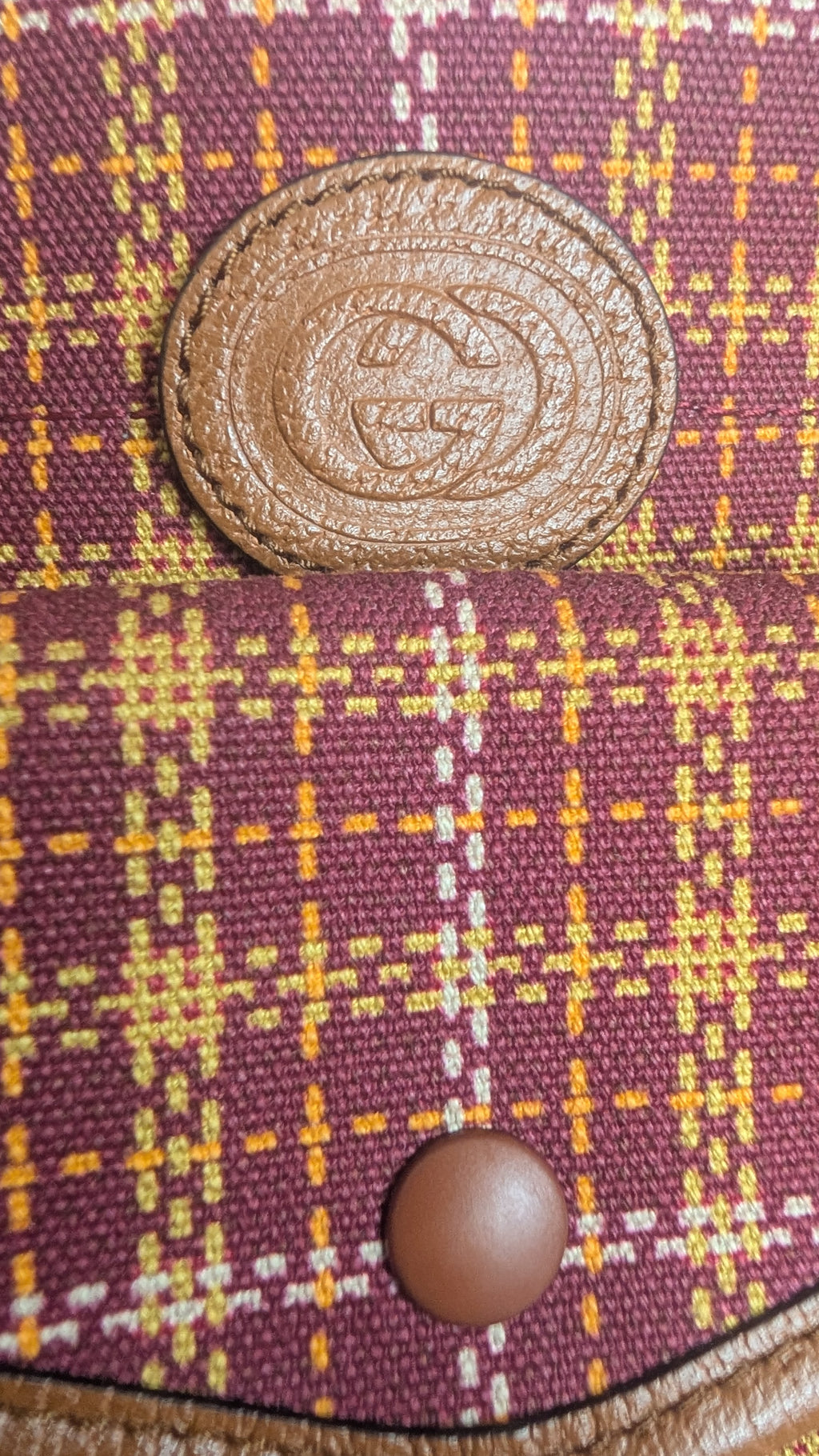 showing close up of GG Pre-Owned Gucci Interlocking GG Plaid Brown Multi Canvas Leather Tote