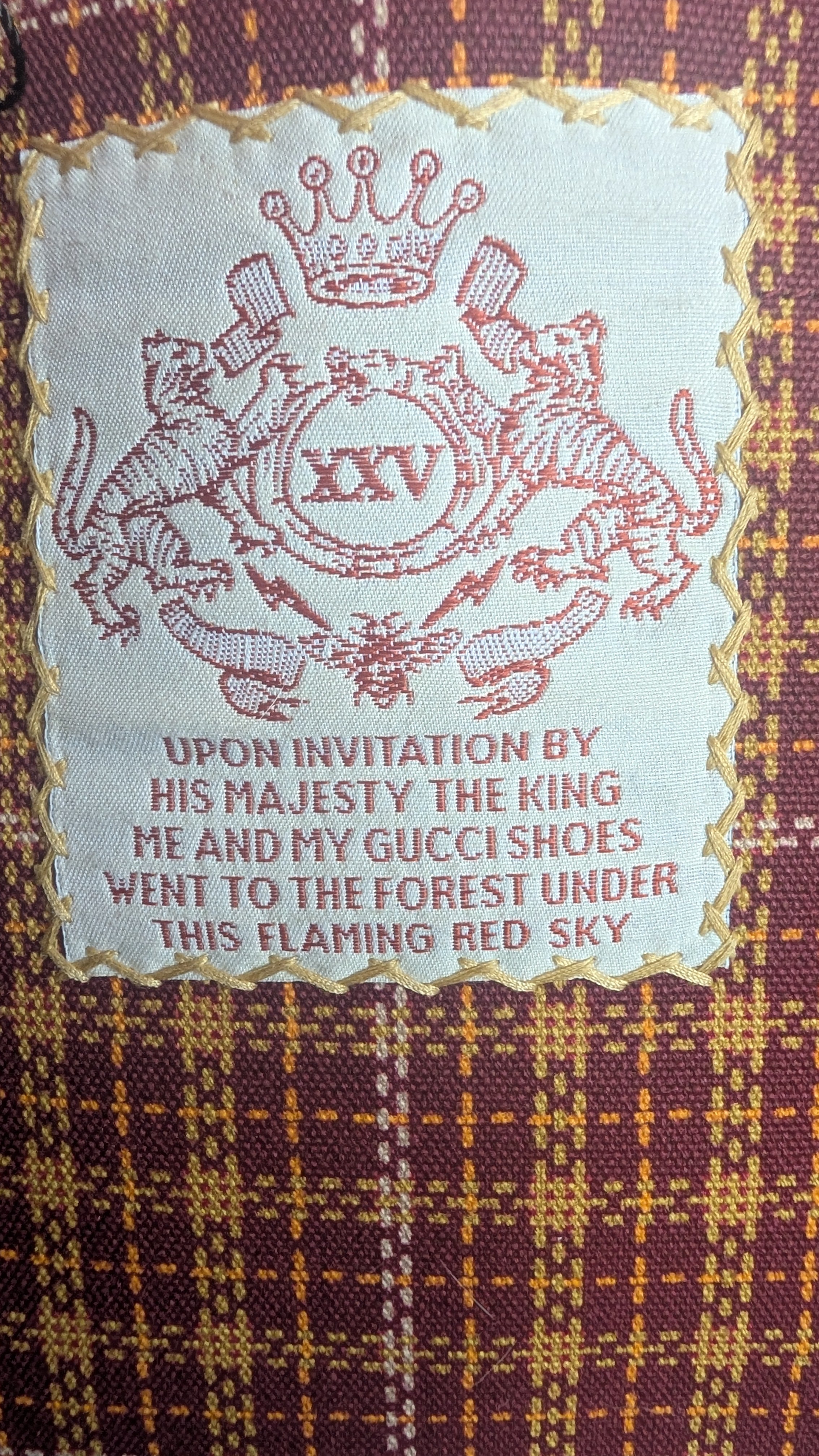 close up of label Pre-Owned Gucci Interlocking GG Plaid Brown Multi Canvas Leather Tote