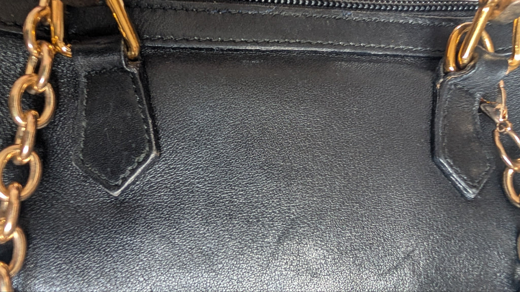 close up of handle connections GUCCI Bamboo Mini Black Leather Bamboo Shoulder Bag 
