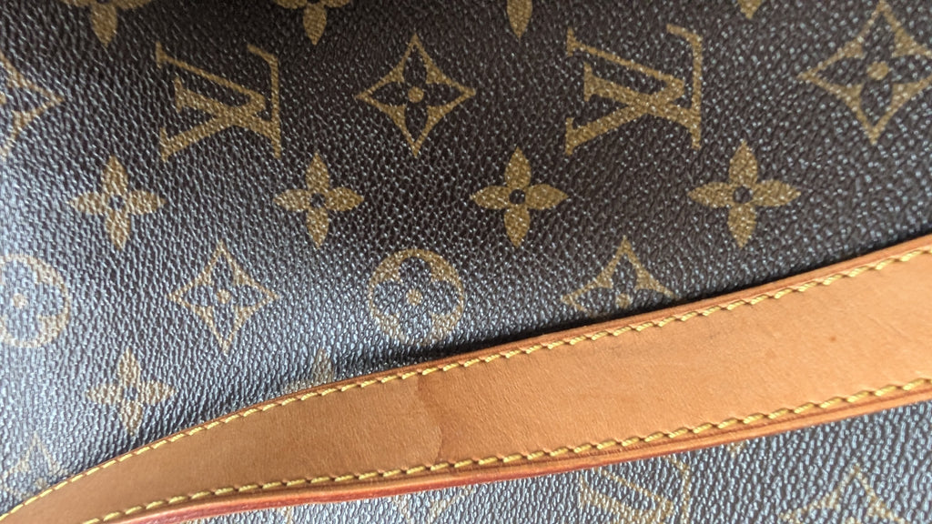 showing m\rk on srap Pre-Owned Louis Vuitton Hudson GM Monogram