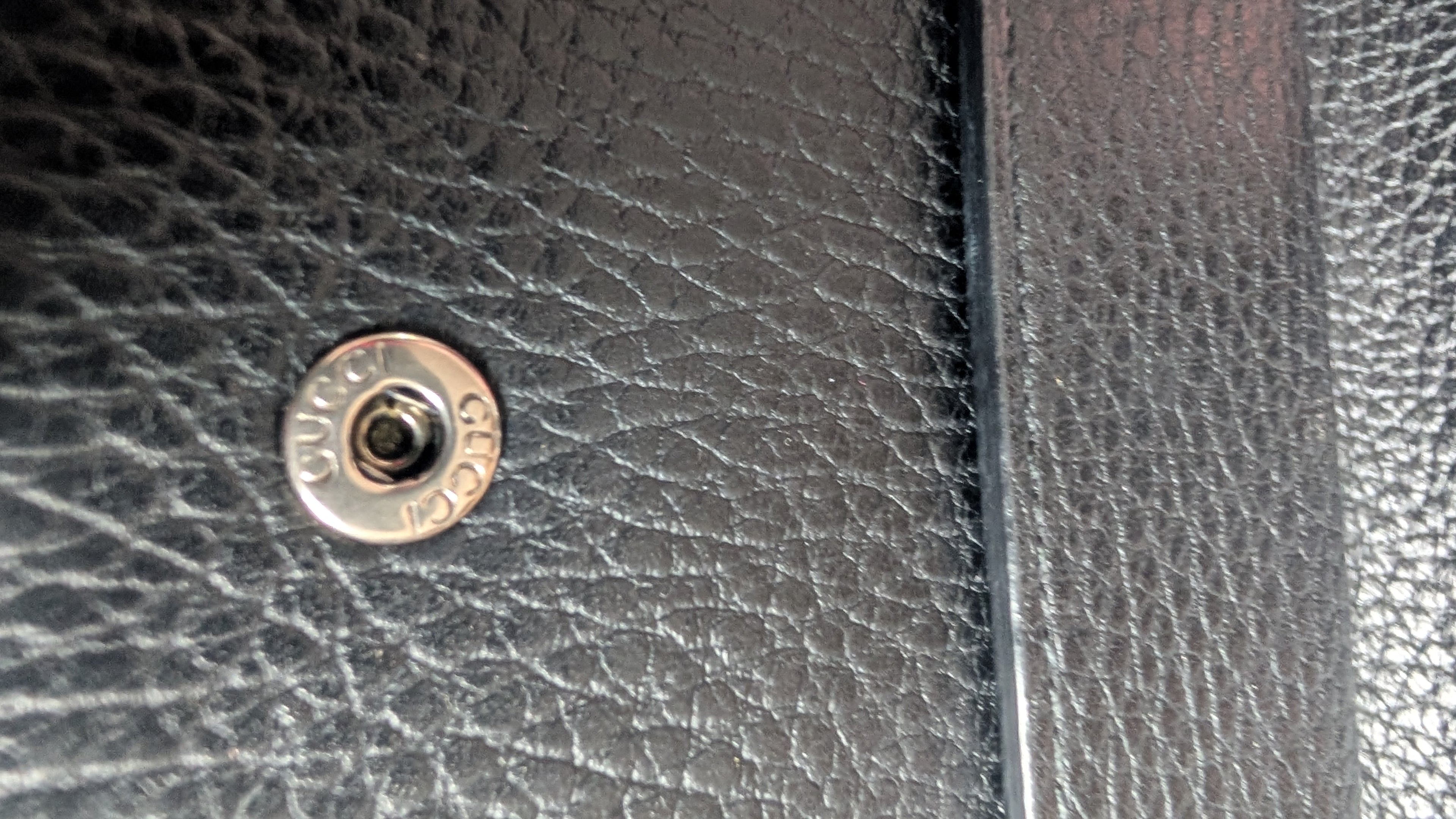 showing clasp sutter Pre-Owned Gucci Dionysus Black Pebbled Leather Mini Bag