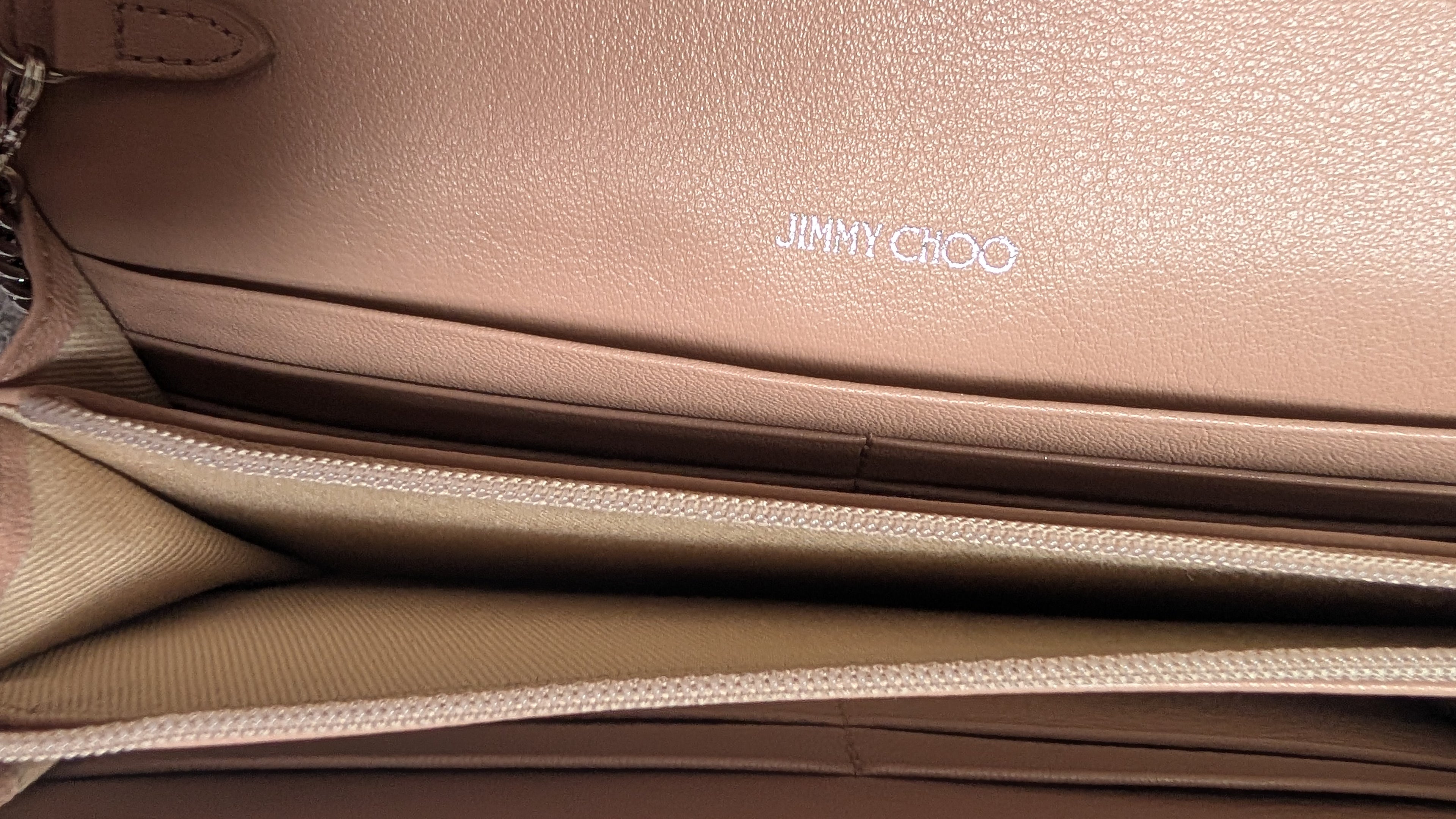 inside condition of Pre-Owned Jimmy Choo Cheri Continental Encrusted Powder Pink Wallet On Chain