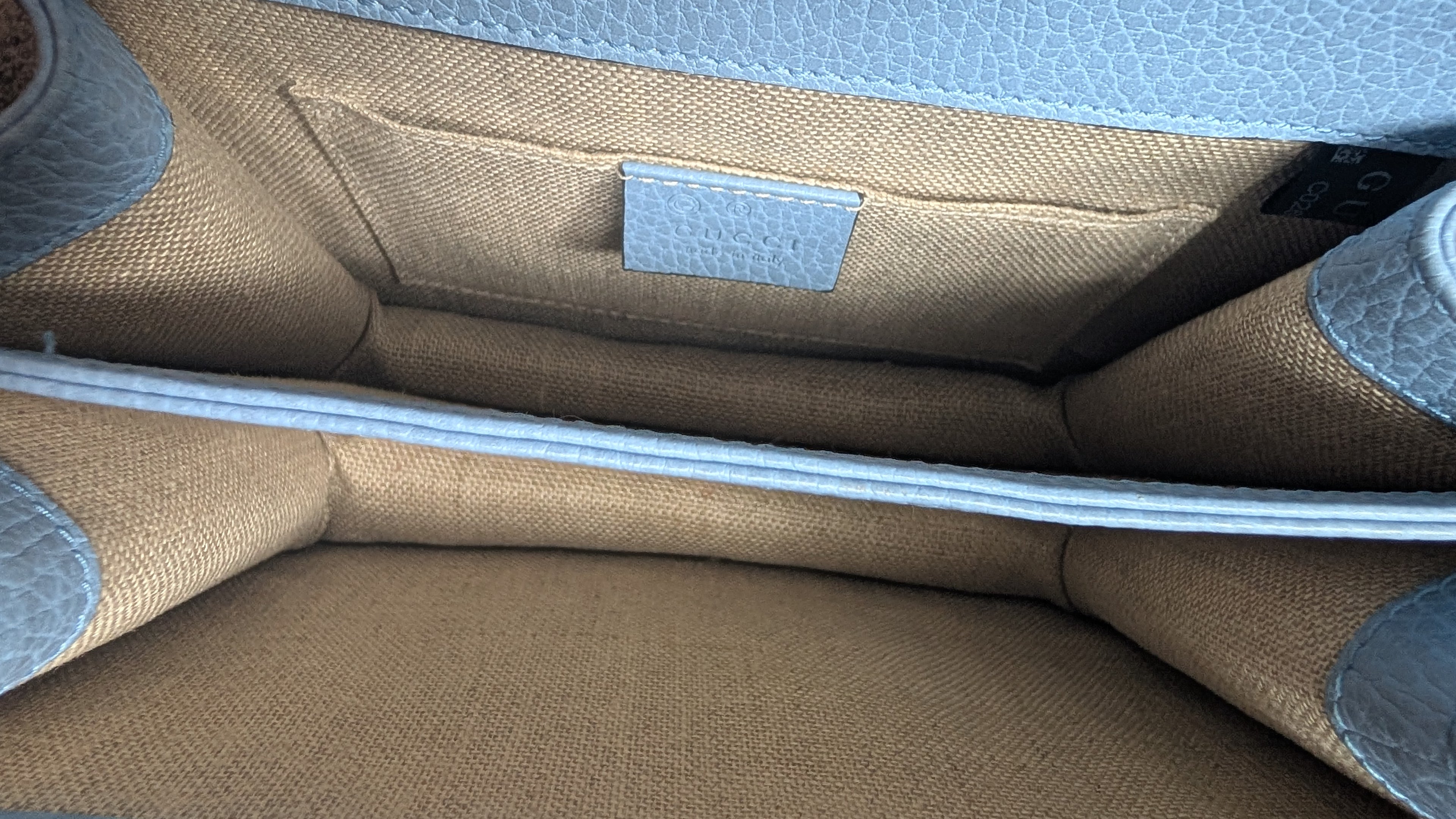 inside xondition of Pre-Owned Blue Gucci GG Interlocking Cross Body Bag