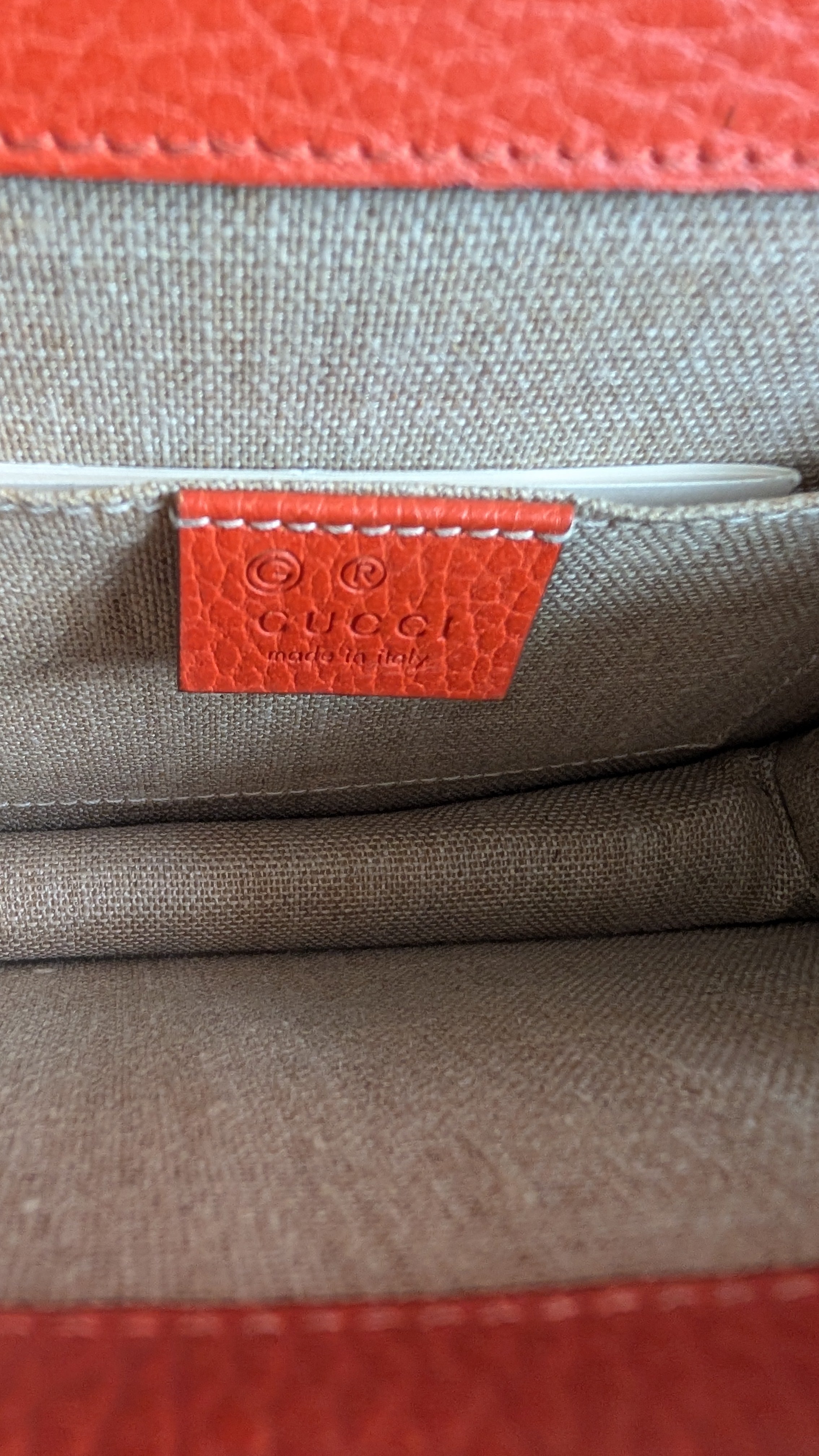 leather gucci label Orange Gucci GG Interlocking Crossbody Bag 