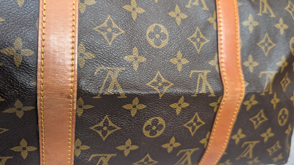 showing other side condition Pre-Owned Louis Vuitton Keepall 45 Sac Souple Model Duffle bag