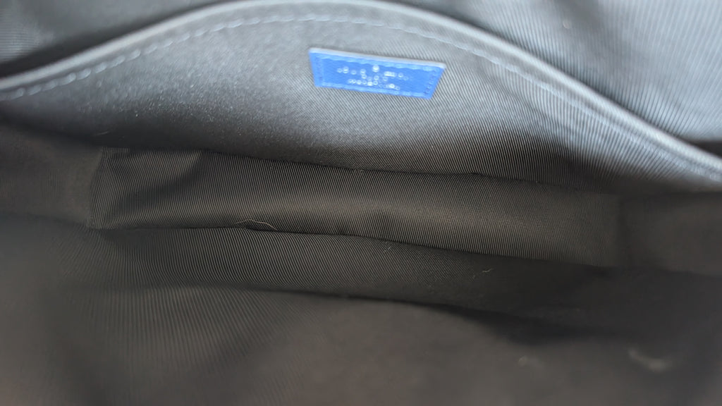 inside clean Louis Vuitton Outdoor Messenger – Blue Taïga Leather &amp; Monogram Eclipse Blue.