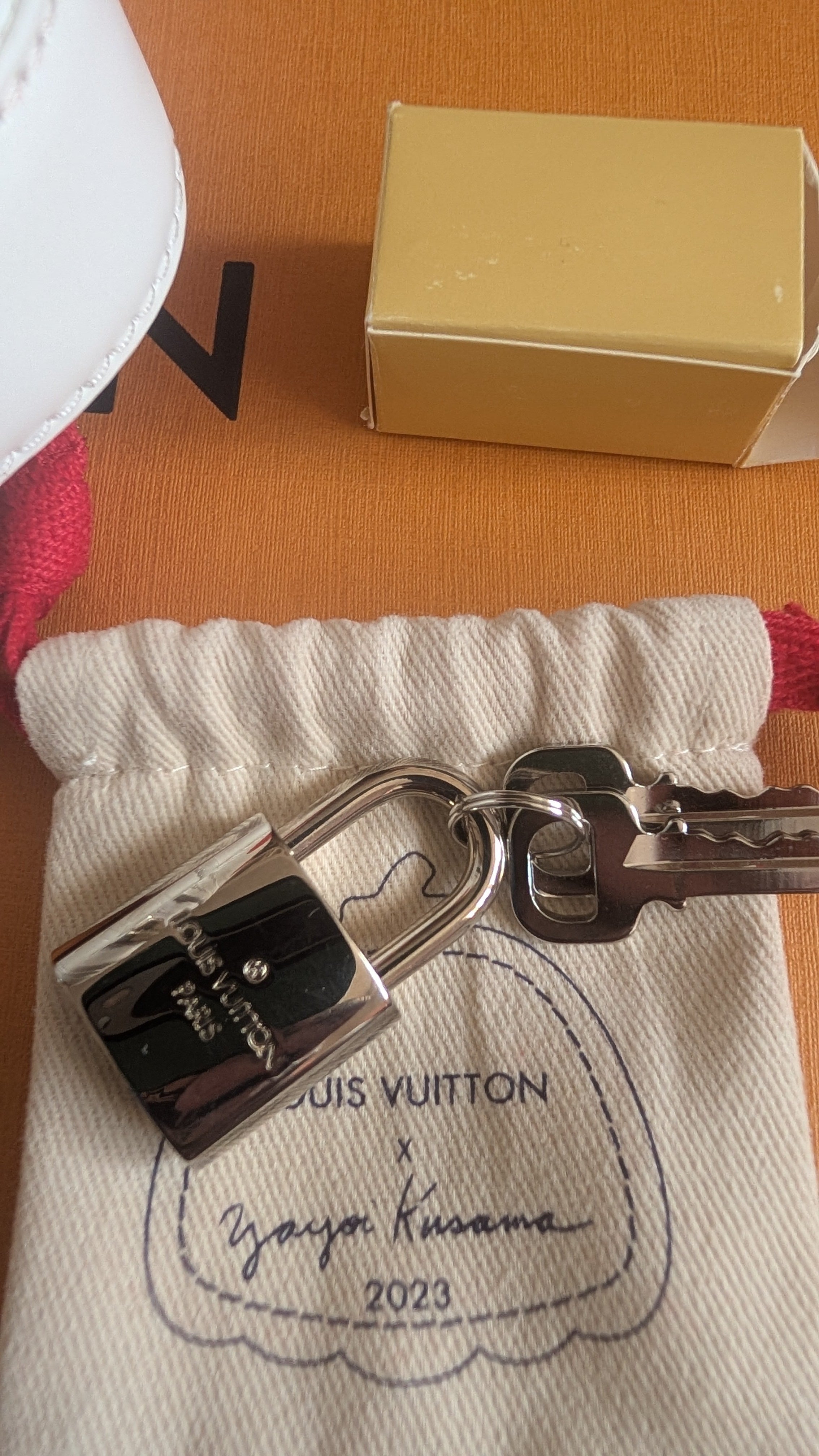 padlock and key Louis Vuitton x Yayoi Kusama Alma BB Shoulder Bag