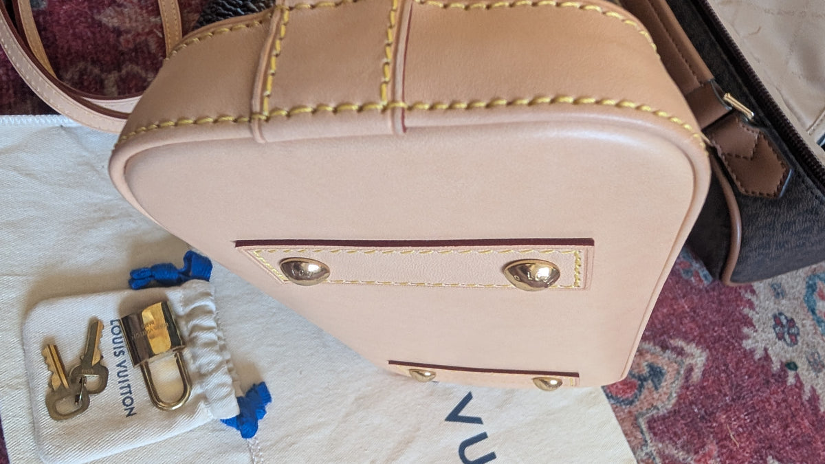 full bottom view Pre-Owned Louis Vuitton Alma BB Monogram World Tour / Travel Sticker Shoulder Bag