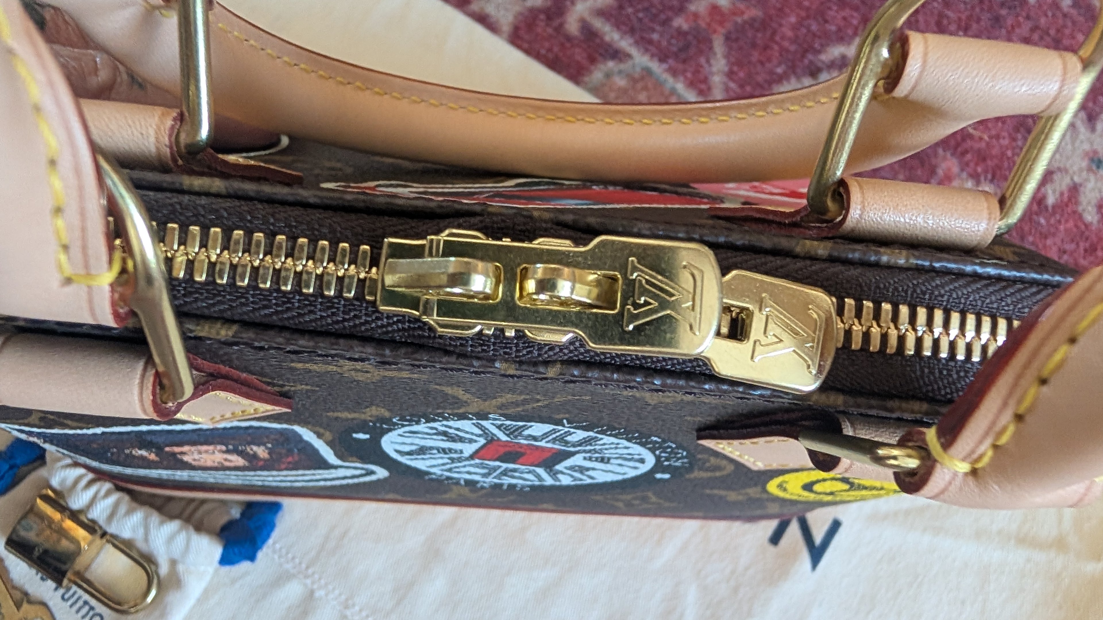 zip Pre-Owned Louis Vuitton Alma BB Monogram World Tour / Travel Sticker Shoulder Bag