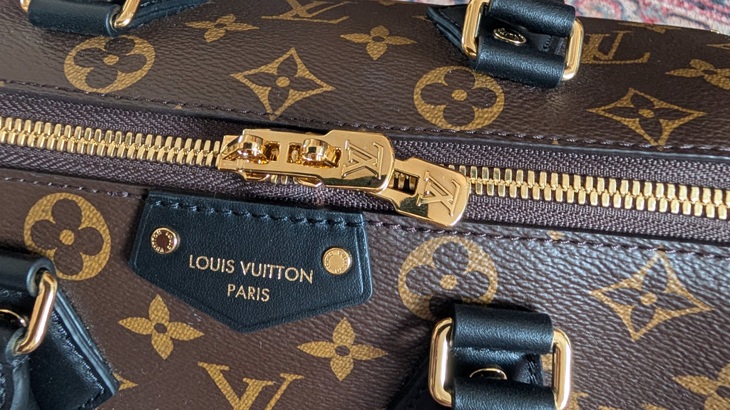 zip condition Pre-Owned Louis Vuitton Speedy Trunk 25 Monogram