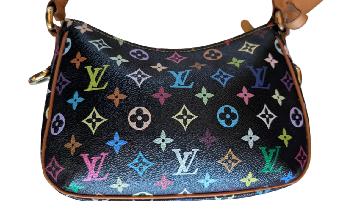 A close-up of a Louis Vuitton shoulder bag featuring the classic multicolor monogram pattern on a black coated canvas, with tan leather trim and gold-tone hardware, resting on a light-colored fabric surface. Pre-Owned Louis Vuitton Takashi Murakami Lodge PM Shoulder Bag