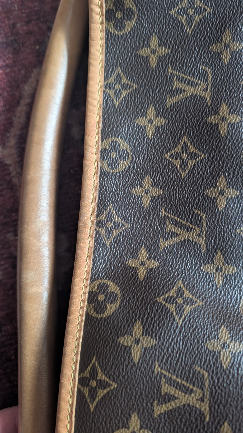 Close-up of a Louis Vuitton monogram canvas bag with dark brown coated canvas, tan monogram print, and a light tan leather trim. Pre-Owned Louis Vuitton Artsy MM Monogram Canvas Shoulder Bag 
