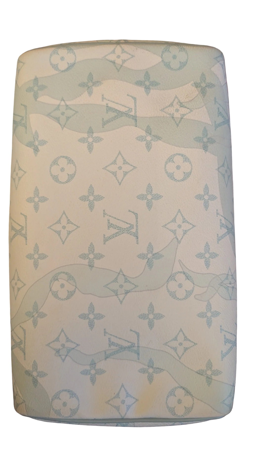 A Louis Vuitton monogram canvas bag or case cover, featuring the classic light blue and off-white LV pattern, photographed from directly above on a patterned rug. Pre-Owned Louis Vuitton x Richard Prince Limited Edition Monogram Bag – Spring/Summer 2008 – Pale Blue